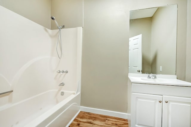 3500 32nd St, Port Arthur, TX 77642 - bathroom with vanity, wood finished floors, and shower / tub combination