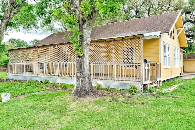 3500 32nd St, Port Arthur, TX 77642 - exterior space with roof with shingles and a front yard