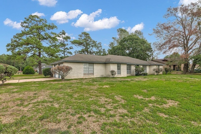 view of property exterior with a yard