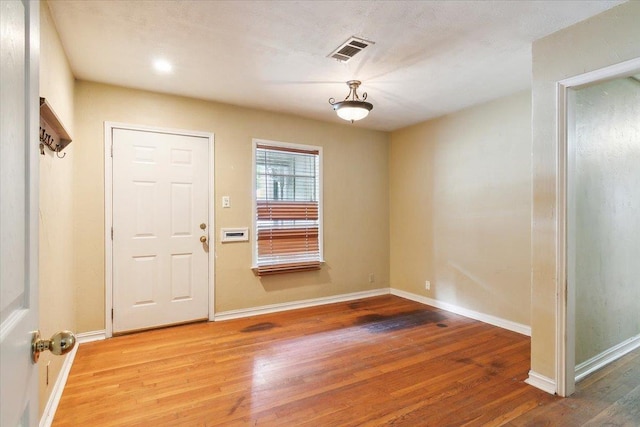 foyer featuring wood-type flooring