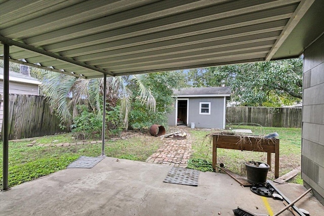 view of patio featuring a storage shed