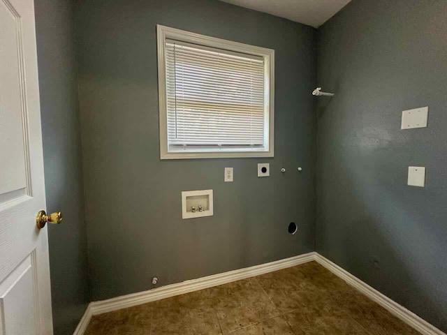 laundry room with hookup for an electric dryer, hookup for a washing machine, and gas dryer hookup