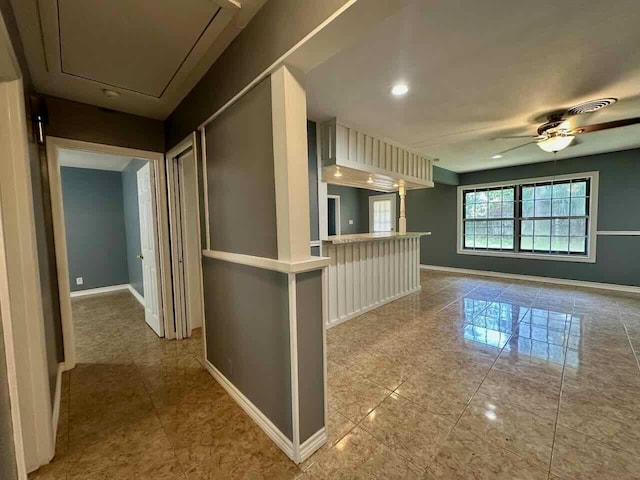 kitchen featuring ceiling fan