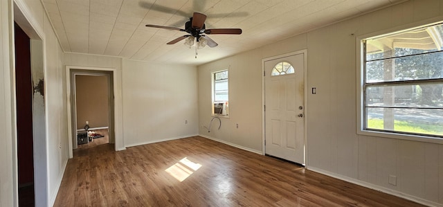 foyer entrance with ceiling fan, hardwood / wood-style flooring, and a healthy amount of sunlight