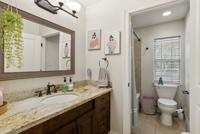 1025 Creek Bend Dr, Jasper, TX 75951 - bathroom with tile patterned flooring, vanity, and toilet