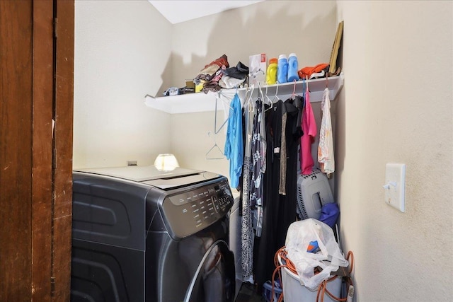 laundry area with laundry area and separate washer and dryer