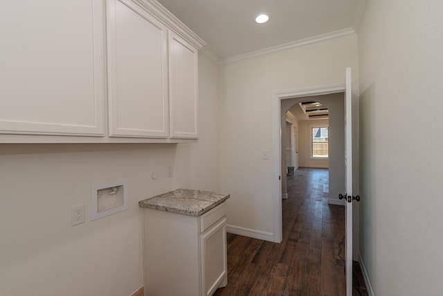 hall with dark wood-style floors, arched walkways, recessed lighting, ornamental molding, and baseboards