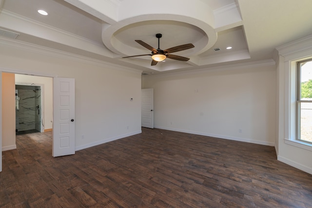 spare room with dark wood-style flooring, coffered ceiling, and plenty of natural light