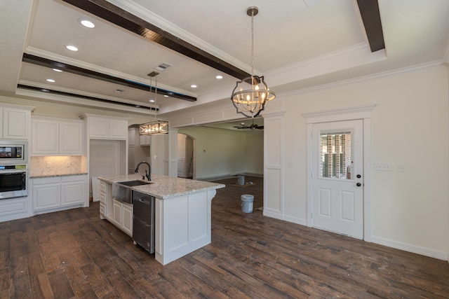 kitchen with arched walkways, appliances with stainless steel finishes, dark wood-style flooring, white cabinetry, and a sink