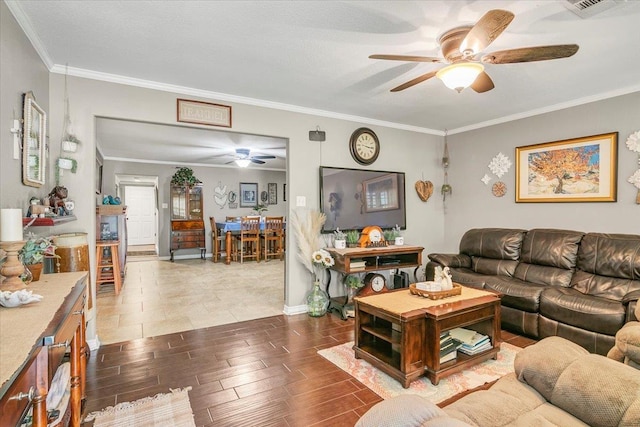 410 Christy Ln, Bridge City, TX 77611 - living area with ceiling fan, crown molding, and dark wood-style flooring