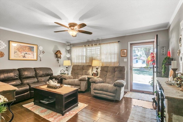 410 Christy Ln, Bridge City, TX 77611 - living room with ceiling fan, dark wood finished floors, ornamental molding, and a textured ceiling