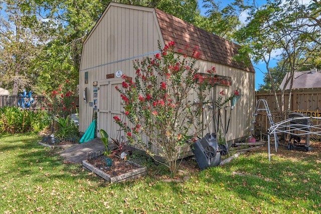 410 Christy Ln, Bridge City, TX 77611 - view of outbuilding with a fenced backyard