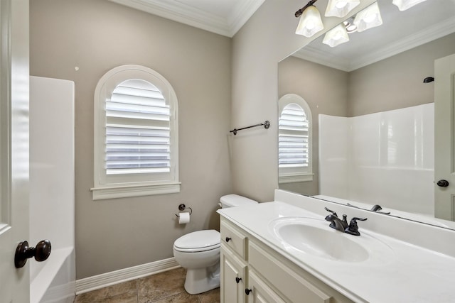 bathroom featuring ornamental molding, vanity, toilet, and baseboards