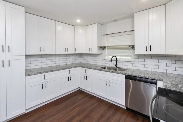 kitchen with white cabinetry, stainless steel appliances, dark hardwood / wood-style flooring, and sink