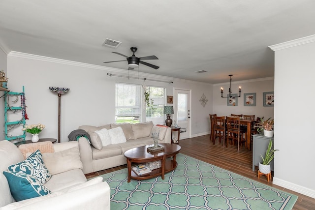 3750 Empire Row, Beaumont, TX 77706 - living room with a chandelier, wood finished floors, a ceiling fan, and crown molding