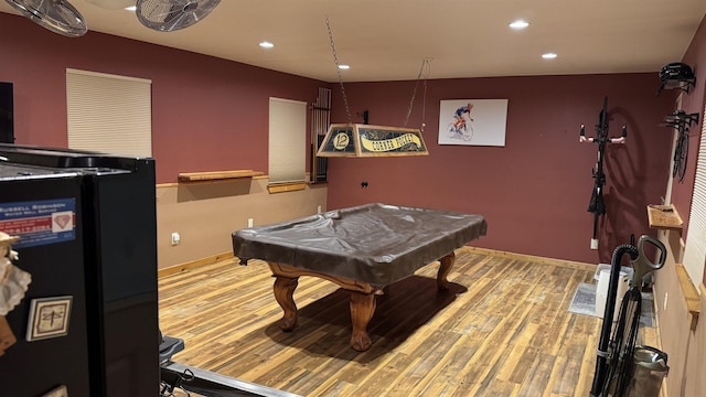 game room featuring billiards and light hardwood / wood-style flooring