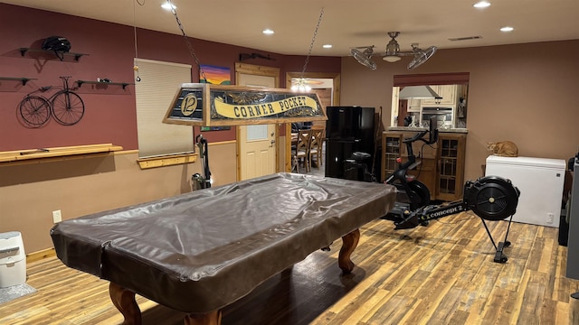 playroom with pool table and light wood-type flooring