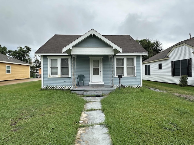 bungalow with a front lawn