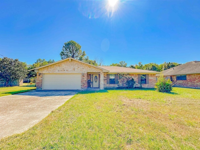 single story home with a front yard and a garage