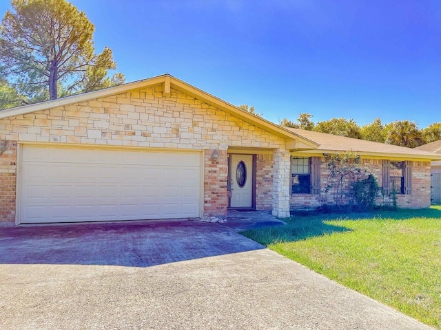 single story home featuring a garage and a front lawn