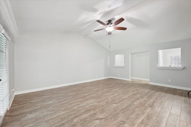 1663 Bluebonnet St, Vidor, TX 77662 - unfurnished bedroom with wood finished floors, baseboards, a textured ceiling, multiple windows, and a closet