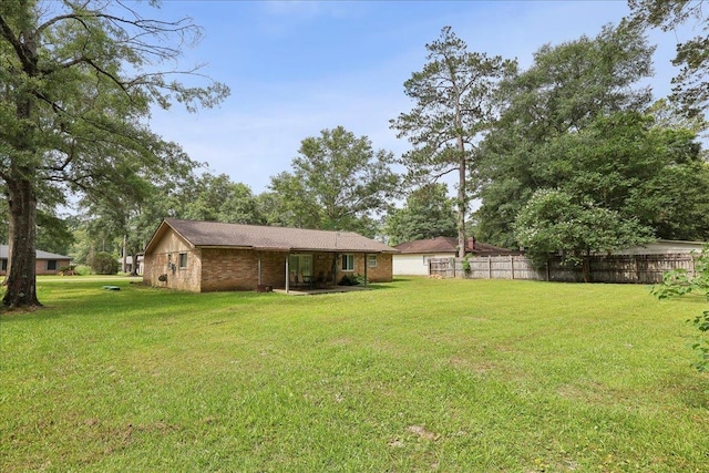 1663 Bluebonnet St, Vidor, TX 77662 - view of yard