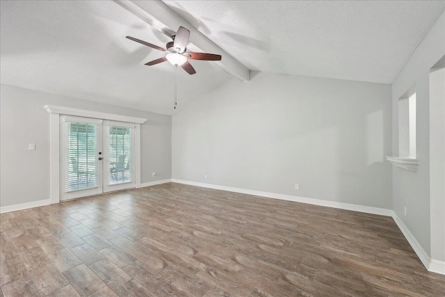 1663 Bluebonnet St, Vidor, TX 77662 - spare room with french doors, wood finished floors, ceiling fan, a textured ceiling, and baseboards