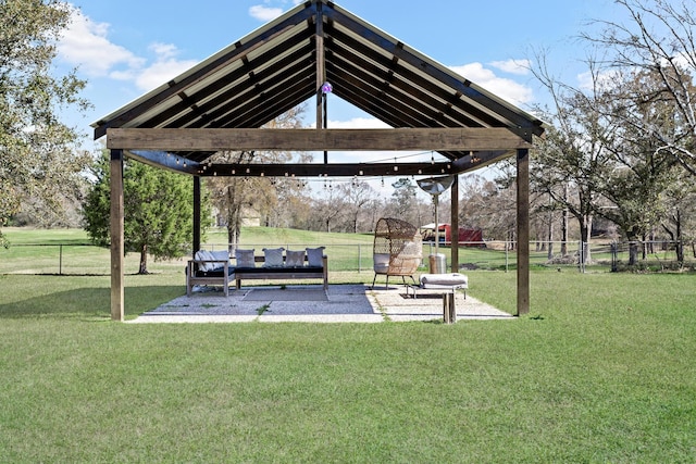 view of yard featuring a gazebo, a patio area, and fence