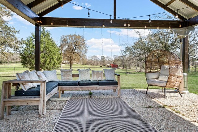 view of patio / terrace featuring fence