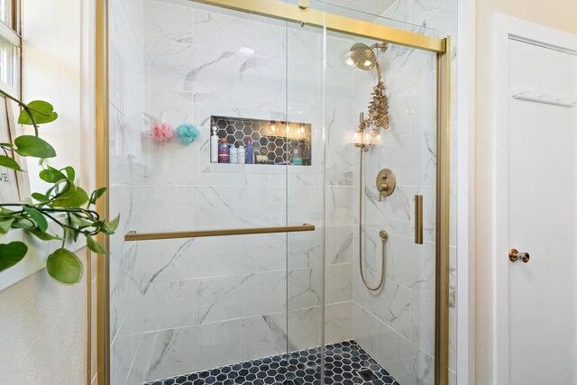 full bathroom with a stall shower