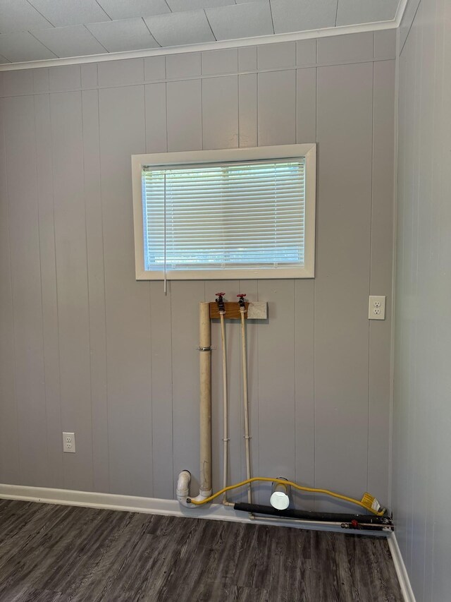 room details featuring crown molding and wood-type flooring