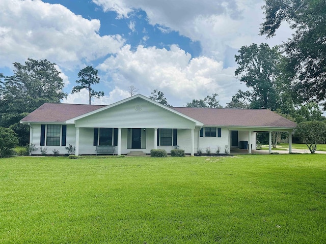 8594 Morgan Ln, Orange, TX 77632 - single story home with a front lawn and a carport