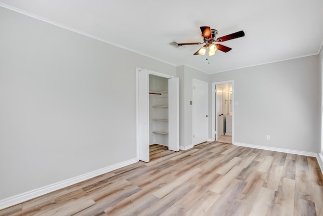 unfurnished bedroom with ceiling fan, light hardwood / wood-style floors, and a closet