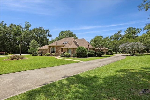 4711 Burns Cir, Orange, TX 77630 - view of front facade featuring a front yard