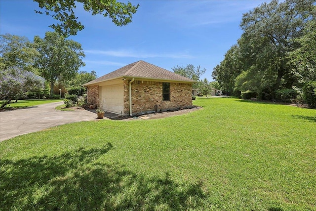 4711 Burns Cir, Orange, TX 77630 - view of property exterior with brick siding, a lawn, concrete driveway, a shingled roof, and an attached garage