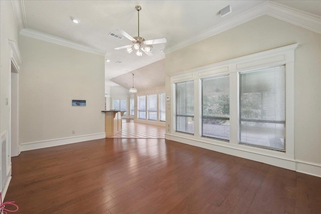 4711 Burns Cir, Orange, TX 77630 - unfurnished living room featuring lofted ceiling, a ceiling fan, wood-type flooring, baseboards, and crown molding