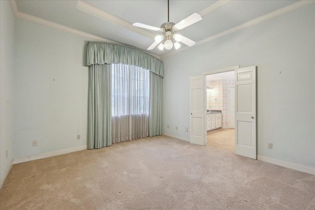 4711 Burns Cir, Orange, TX 77630 - unfurnished bedroom featuring ornamental molding, carpet, baseboards, and ensuite bathroom