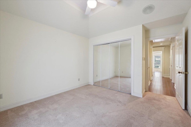 4711 Burns Cir, Orange, TX 77630 - unfurnished bedroom with carpet floors, attic access, a closet, baseboards, and a ceiling fan