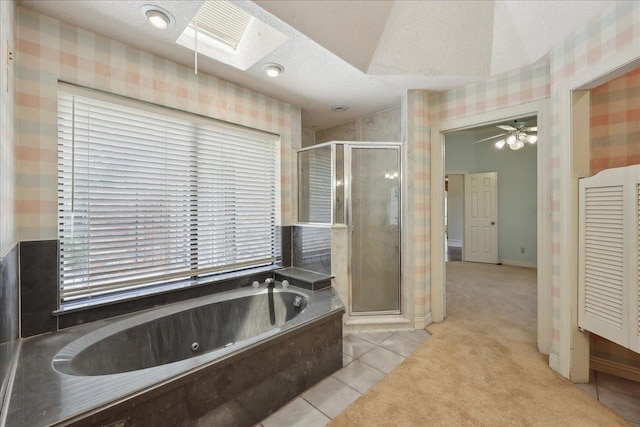 4711 Burns Cir, Orange, TX 77630 - full bath with wallpapered walls, a shower stall, a tub with jets, a textured ceiling, and tile patterned floors