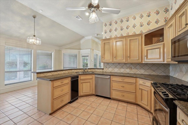 4711 Burns Cir, Orange, TX 77630 - kitchen featuring appliances with stainless steel finishes, a sink, plenty of natural light, light tile patterned floors, and ornamental molding