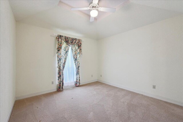 4711 Burns Cir, Orange, TX 77630 - spare room featuring light colored carpet, baseboards, and a ceiling fan