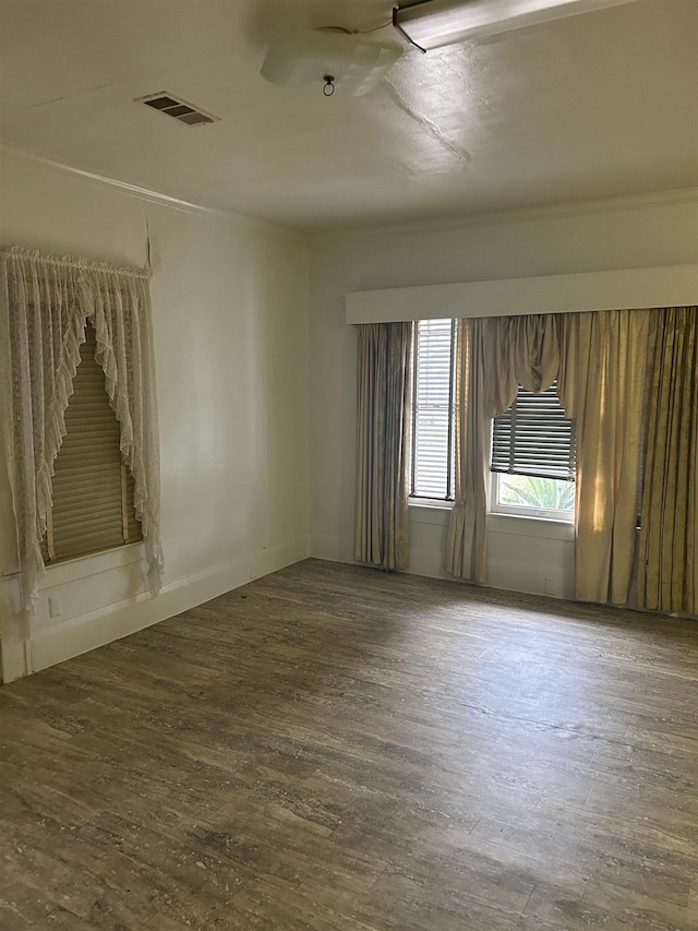 unfurnished room featuring hardwood / wood-style floors