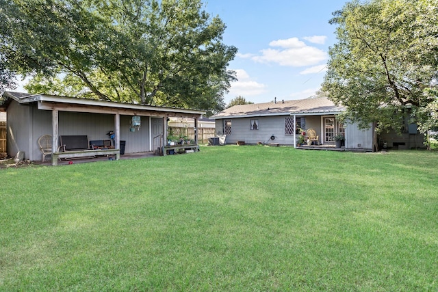 view of yard featuring fence
