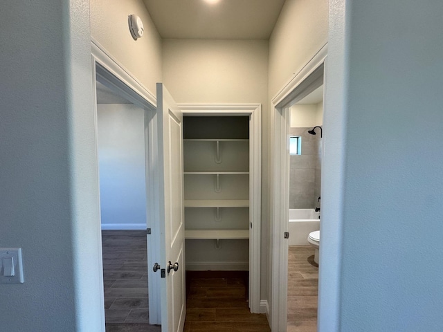 14865 Norma Jane Ln, Beaumont, TX 77713 - corridor with dark wood-type flooring