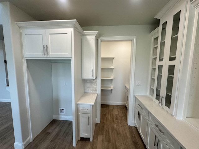 14865 Norma Jane Ln, Beaumont, TX 77713 - mudroom featuring dark wood-type flooring and baseboards