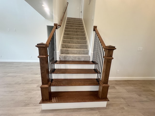 14865 Norma Jane Ln, Beaumont, TX 77713 - staircase featuring wood finished floors and baseboards