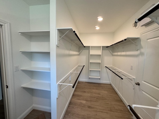 14865 Norma Jane Ln, Beaumont, TX 77713 - walk in closet featuring dark wood-style flooring