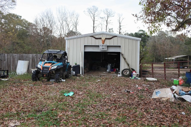 view of outdoor structure with a garage