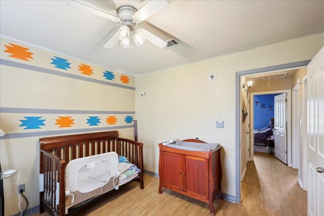 bedroom featuring multiple windows