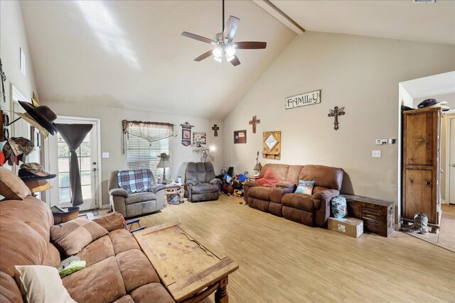 kitchen featuring light tile patterned floors, fridge, a notable chandelier, dark brown cabinets, and pendant lighting